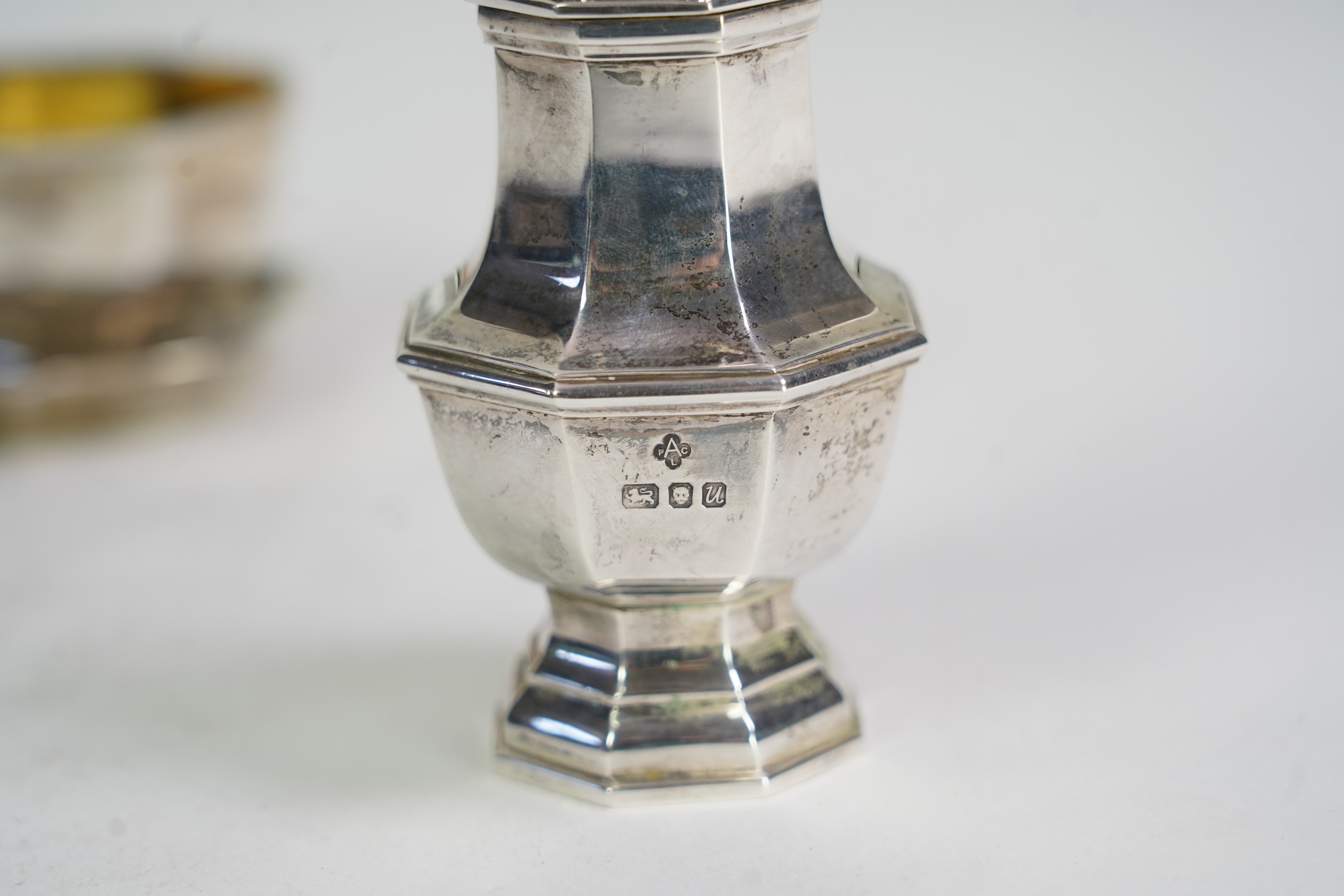 An Elizabeth II Asprey & Co silver three piece condiment set on stand